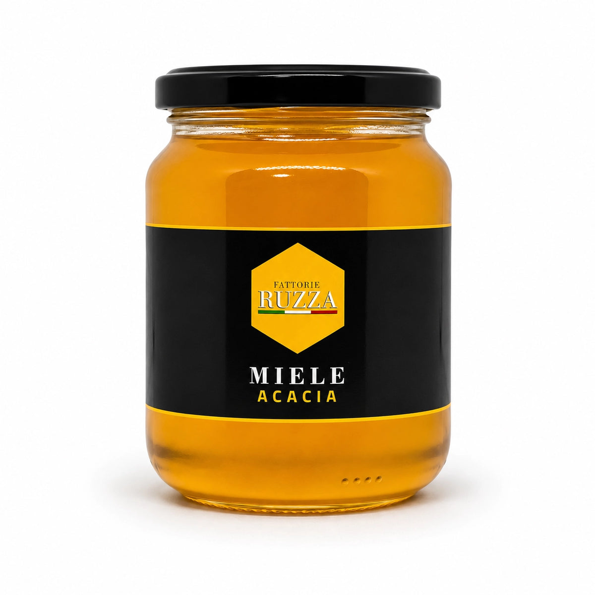 Vasetto in vetro di miele di acacia Fattorie Ruzza con etichetta nera e logo esagonale giallo, confezione da 500 g, fotografato su sfondo bianco.